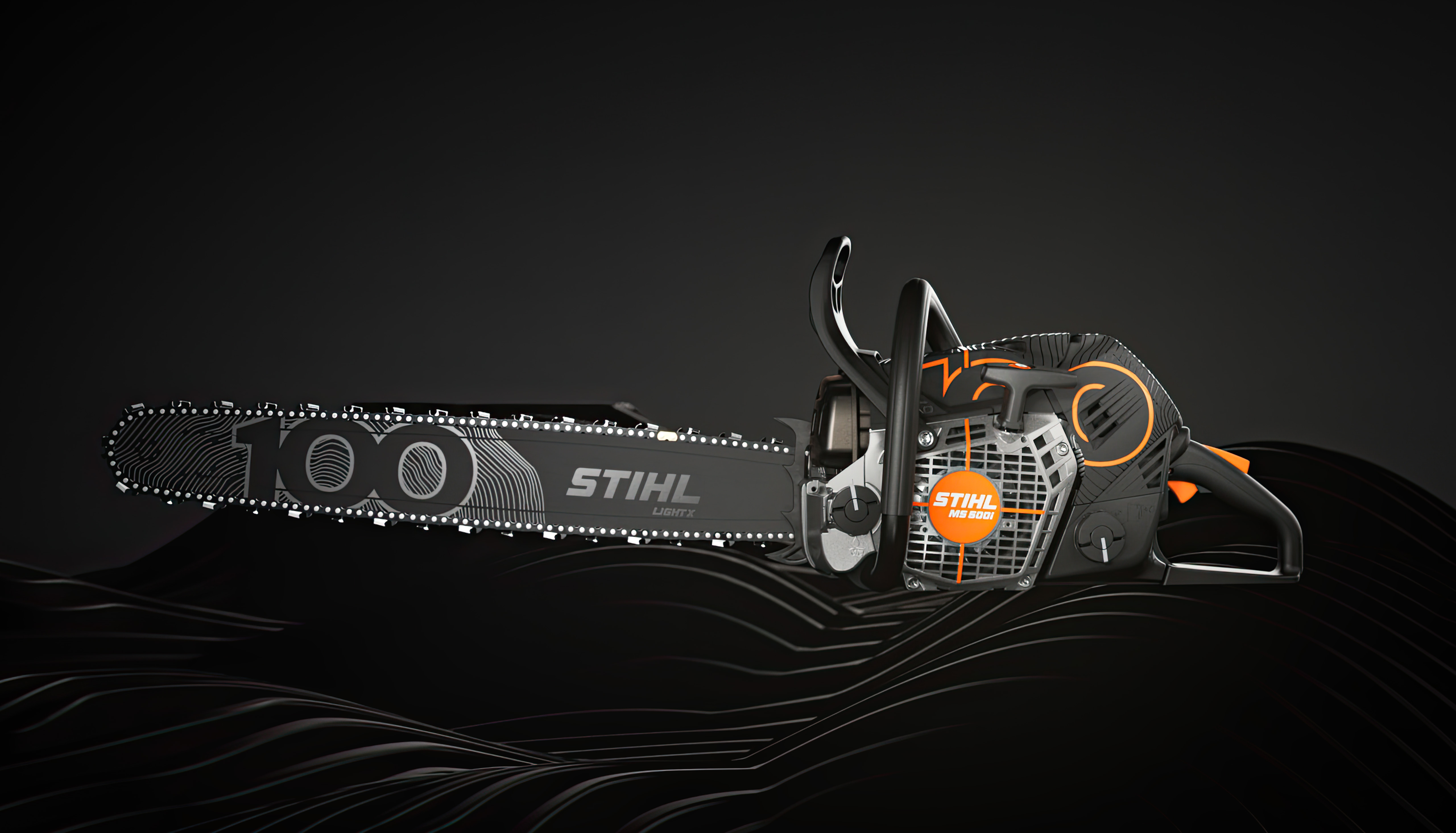 STIHL kettingzaag MS 500i Centennial Edition zijaanzicht links voor een zwarte achtergrond
